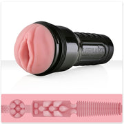 Fleshlight Pink Lady Destroya mit rosafarbener Vulva-Öffnung im schwarzen Gehäuse, darunter ein Längsschnitt der Strukturkammern