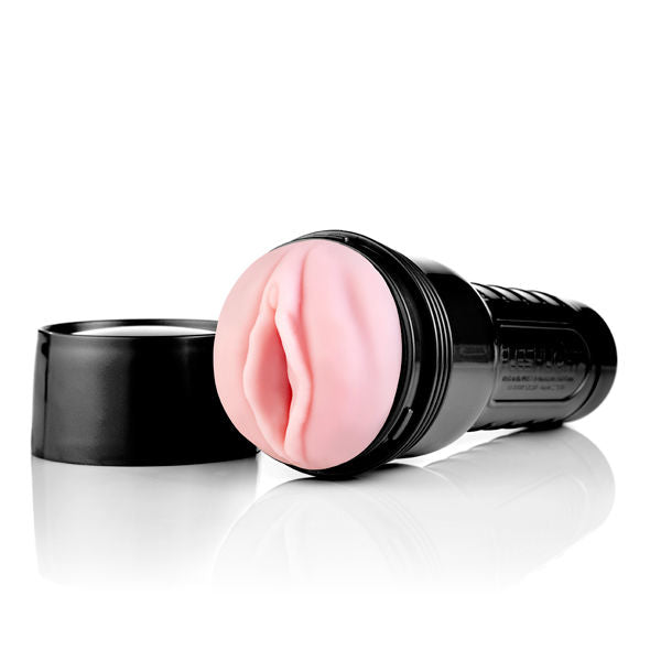 Fleshlight Pink Lady Original mit rosafarbener Vulva-Öffnung im schwarzen Gehäuse, daneben der Deckel
