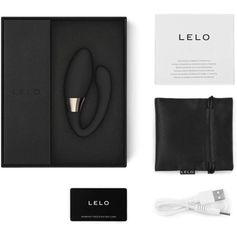 Geöffnete Verpackung des Tiani Harmony: Toy, Beutel, USB-Kabel und Hefte