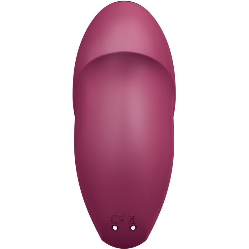 Satisfyer Tap & Climax 1 visto por detrás, con los contactos de carga
