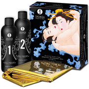 Cofanetto Shunga Oriental Body Slide, due flaconi neri numerati 1 e 2 e telo dorato piegato