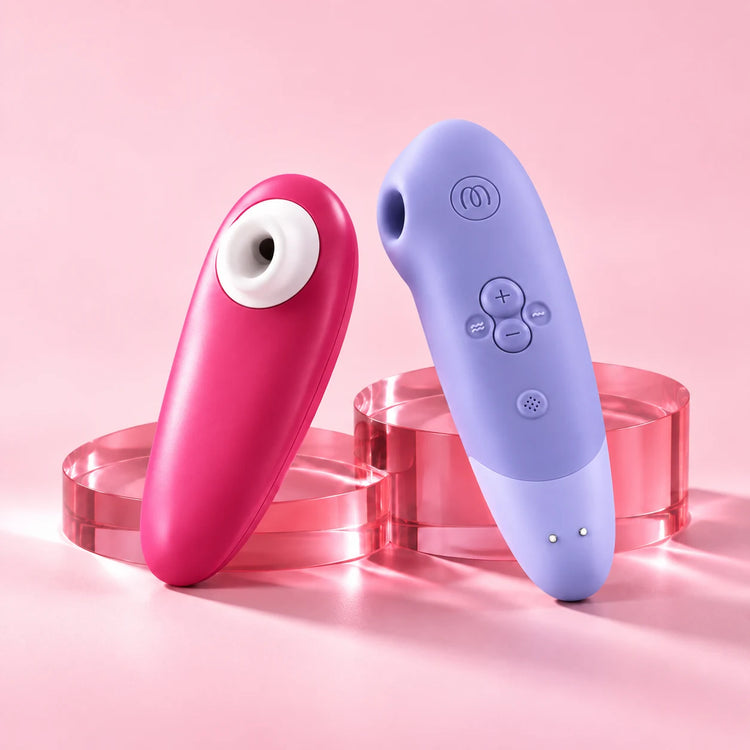 Womanizer Starlet 3 rose et Enhance lilas, boutons et formes en détail.