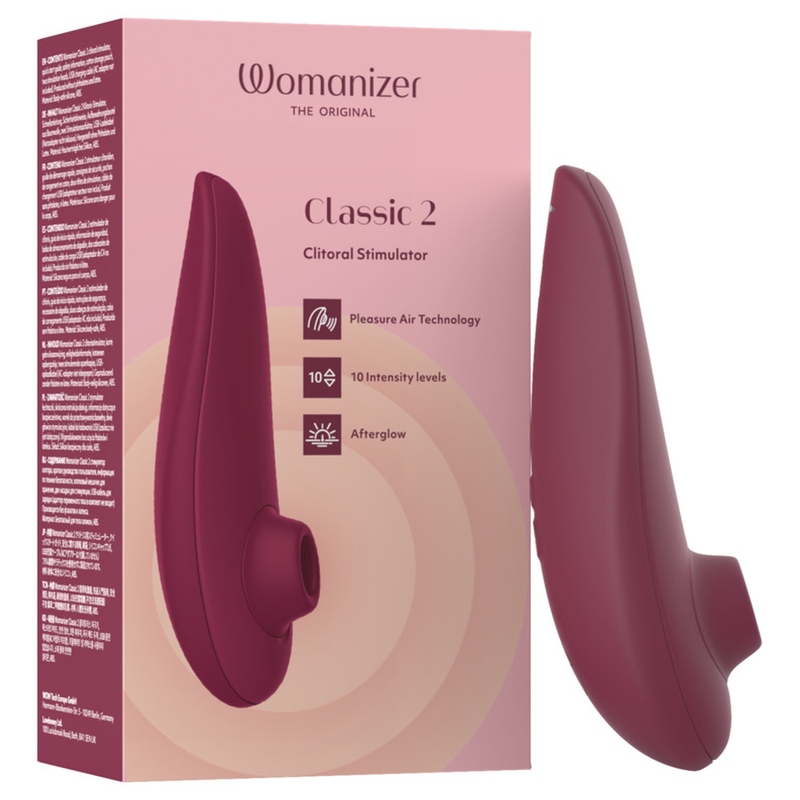 Womanizer Classic 2 in Bordeaux vor seiner rosa Verpackung